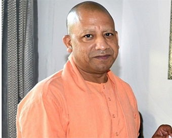 Yogi visits Nritya Gopal Das in hospital