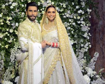 Ranveer, Deepika all smiles at Mumbai wedding reception