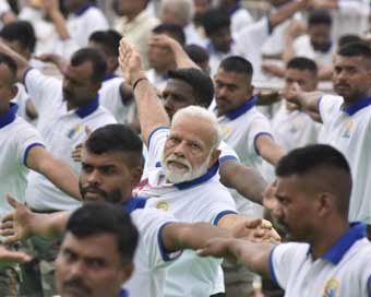 Modi performs yoga with 30,000 people in Ranchi